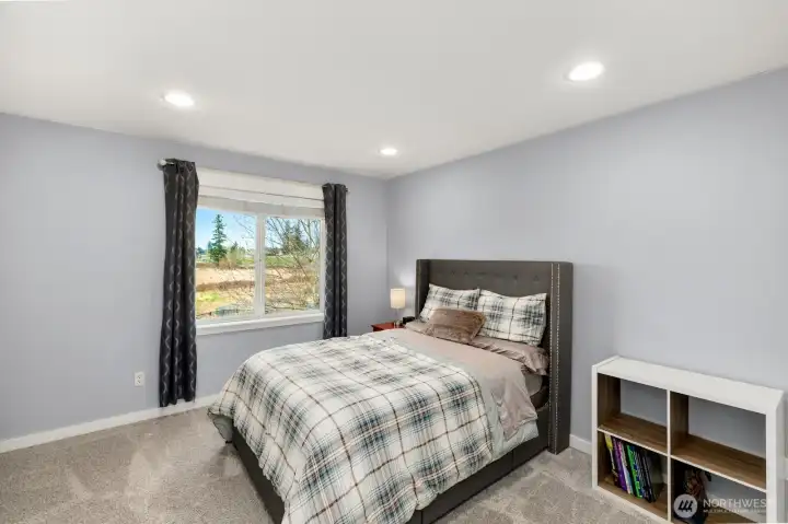 Bedroom #4 with private wetland, sunset & Lake Tapps views!