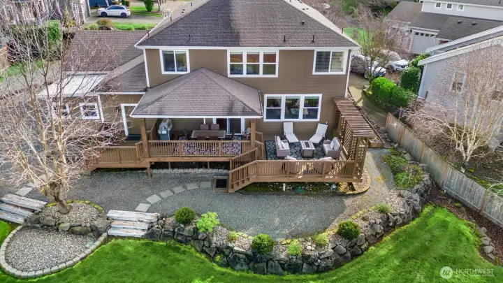 Outdoor living at its finest!  Covered outdoor space and open outdoor space to relax, entertain and enjoy the views!  Incredible sunsets from the deck, backyard and backside of home!