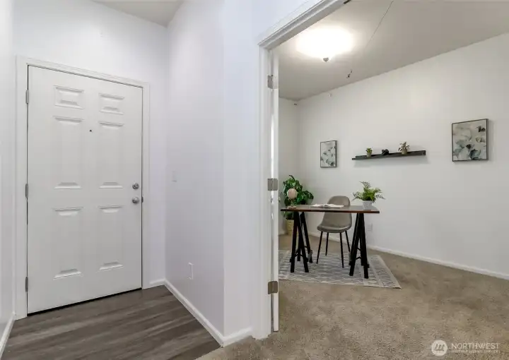 front entry with den just to the left with French doors.