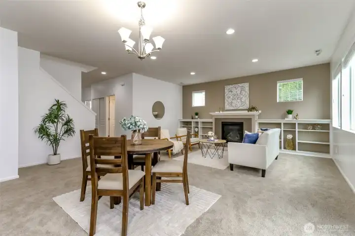 This angle shows the family room and across from the stairway is the full bathroom.