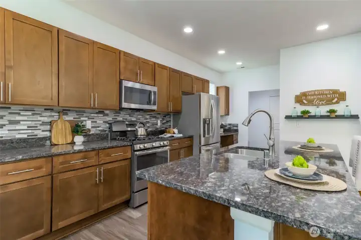 Gas stove /range, built in microwave. All stainless appliances.