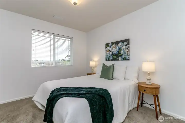 One of the three extra bedrooms. This one faces the front front of the house.