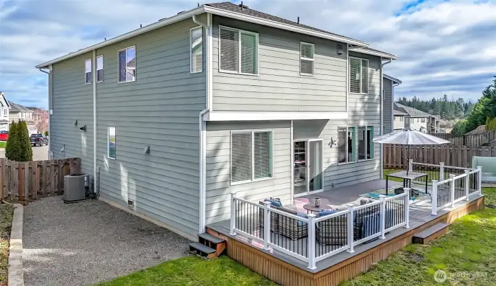 This side of the of the house has the entry gate to backyard.