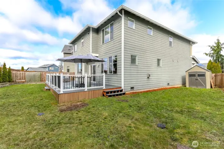 This side of the yard shows the  storage and garden /tool shed.