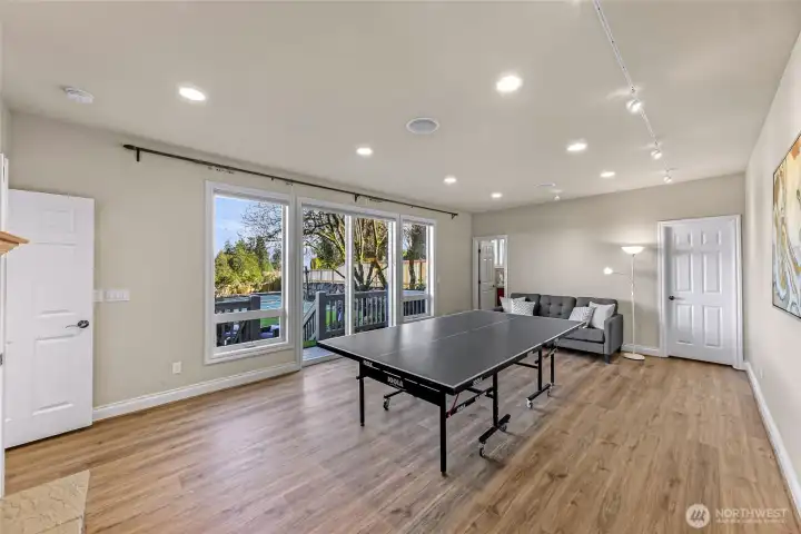 Huge main floor bedroom has walk in closet and bathroom with walk in shower. This could also be a fantastic game room or play room.