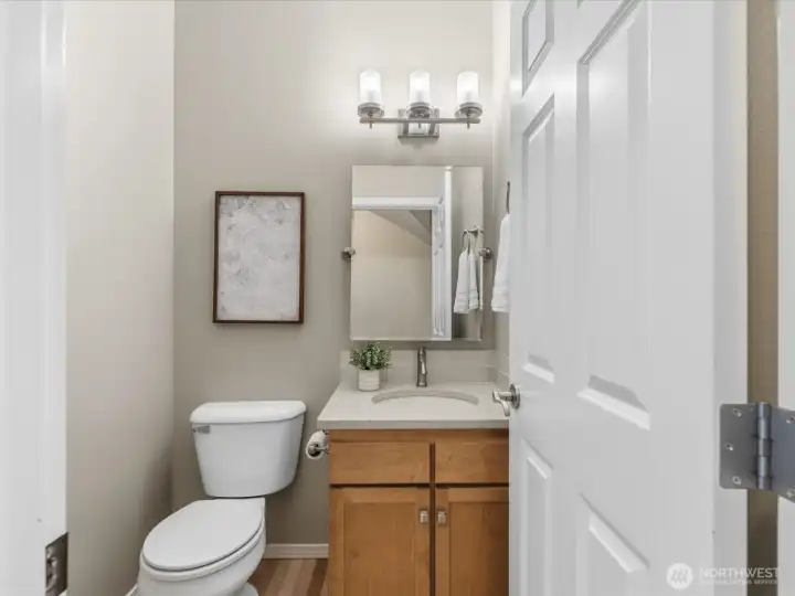 Powder room conveniently located on first floor.