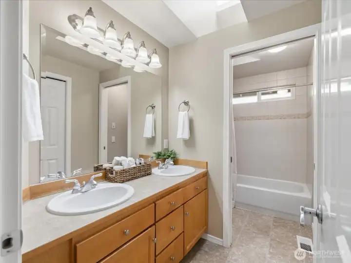 Upstairs bathroom with flexible layout for convenience and privacy.