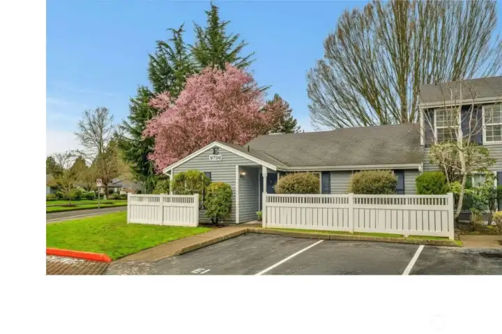 Designated parking space right in front of your front door, as weel as a detached garage.