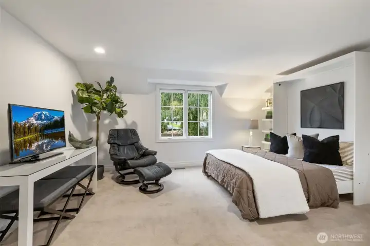 Large guest bedroom with Murphy bed.