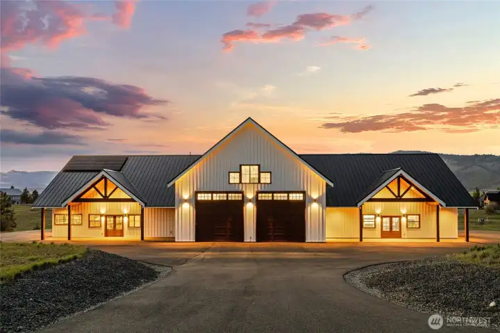 Front view showcasing the 1,760 sq ft living area on the left, with the remaining structure consisting of a 4,752 sq ft shop.