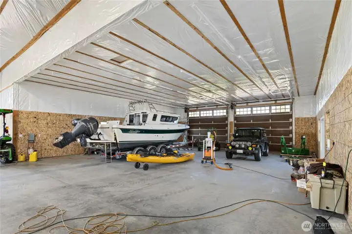 Right side of the shop (as viewed from the front), offering ample space for boats, vehicles, and additional storage.