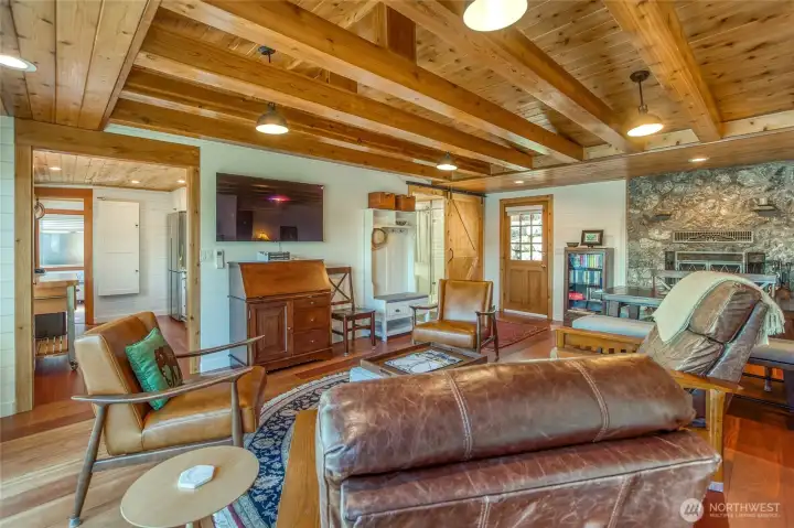 Vaulted ceiling and beams compliment the space.