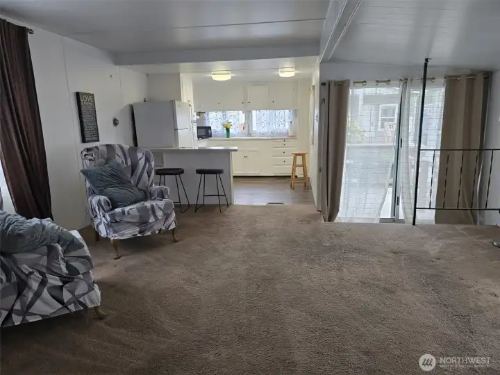Living room and view of Kitchen