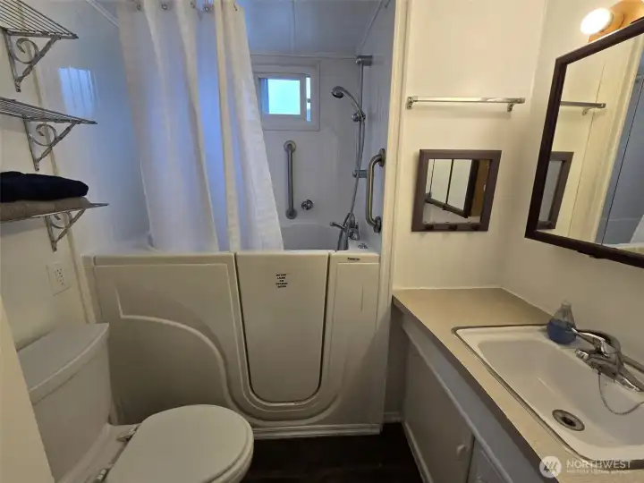 New walk in tub installed with shower