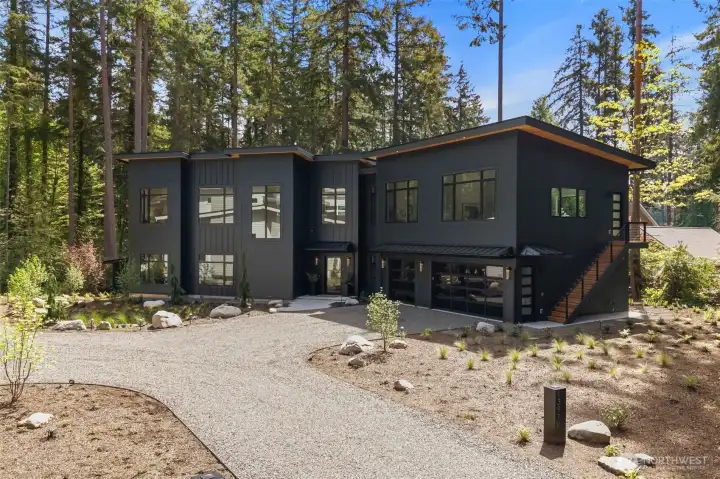 13970 Manzanita Rd NE built on 1 wooded acre.