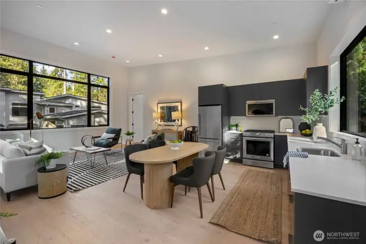 Separate studio for guest or home office space with kitchen, laundry hook ups, guest room and bath