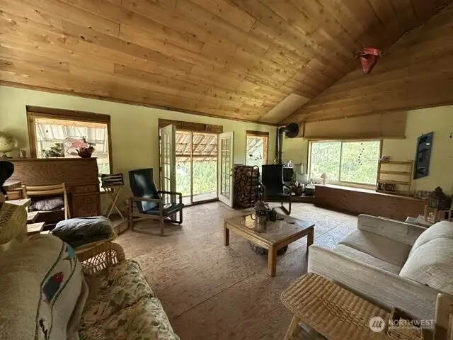Enter the main living space with comfortable and durable furniture. Great for cozying up to a warm fire or relaxing after a hike into the forest.