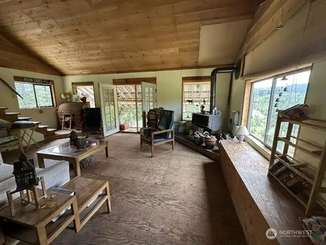 The bench window seat doubles as a great spot to take in the amazing views and wildlife as well as storing wood for the wood stove.