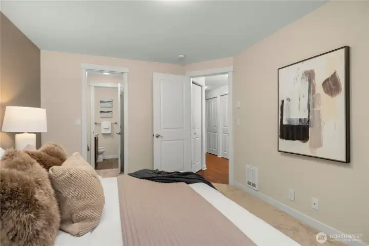 Primary Bedroom. You can see the two closets and primary bathroom. Primary Bedroom. You can see the two closets and primary bathroom.