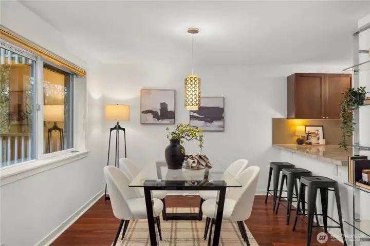 Nice open dining and kitchen space. Bar seating and dining room Nice open dining and kitchen space. Bar seating and dining room