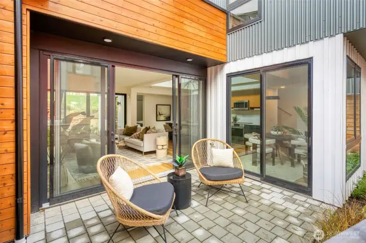 This front patio is one of three inviting outdoor living spaces for your enjoyment. This front patio is one of three inviting outdoor living spaces for your enjoyment.