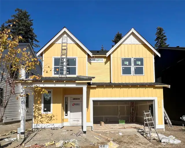 Exterior photo taken 10/24 showing progress on build. All other photos of same home plan built on another lot.