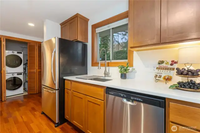 Launrdy closet includes New stackable Washer and Dryer