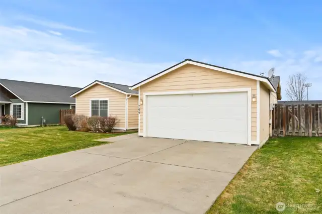 2 car garage with driveway parking