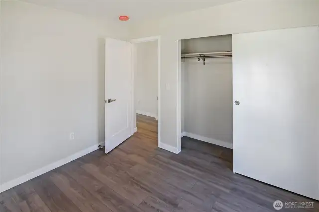 On the main level are two bedrooms and one on the upper level
