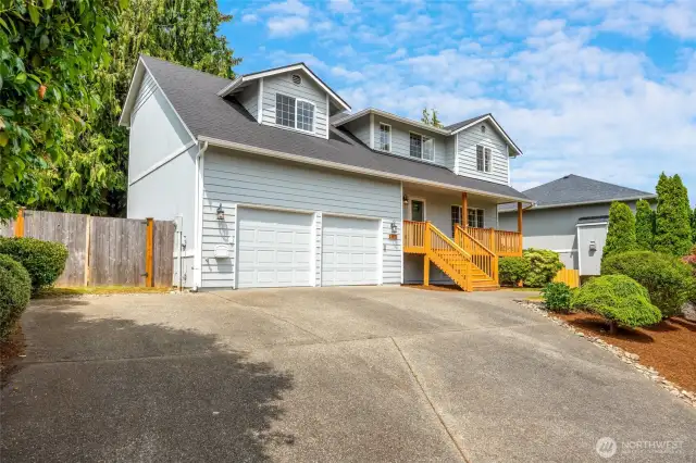 Large driveway allows parking for 6+ cars.