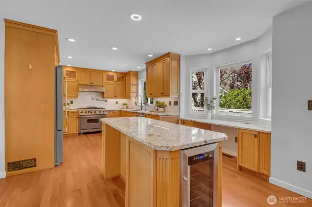 Kitchen island with built in beverage cooler.