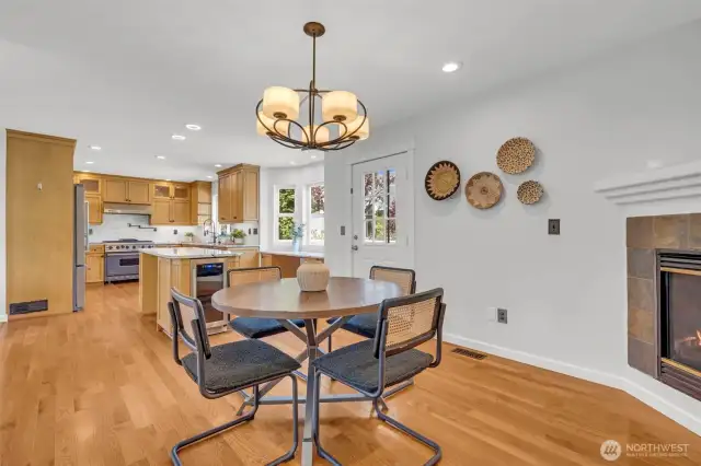 Dining area off the kitchen with gas fireplace.