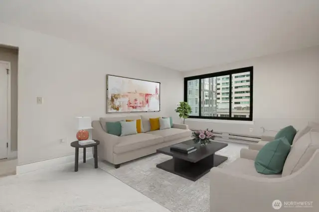 Another view of the living room and the south-facing window.  Virtually staged living room from another angle.