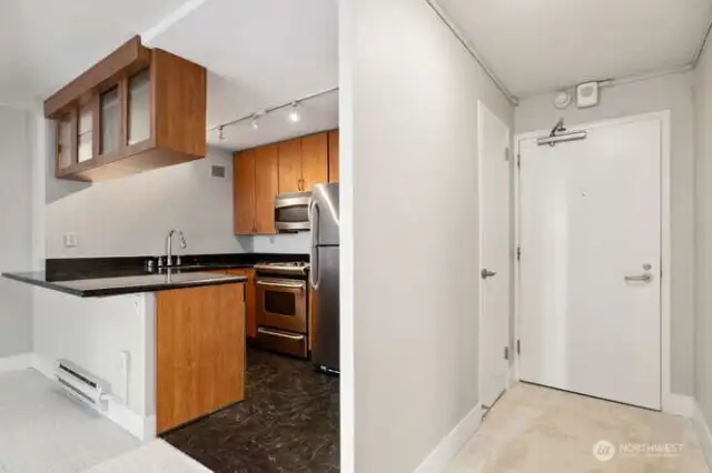New carpet and kitchen flooring, fresh paint throughout.  Stainless appliances, cherry cabinets.