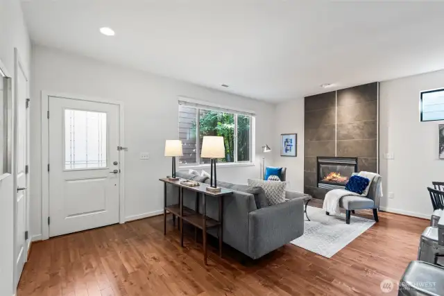 Spacious living room with abundant natural light and open flow.