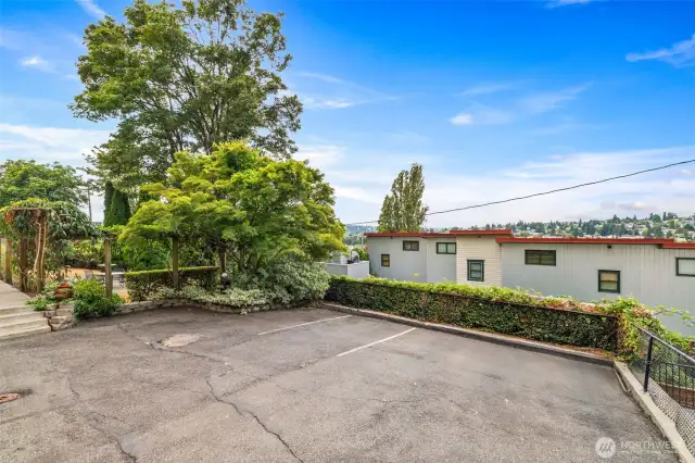 Uncover parking spaces (One spot is currently available for potential buyer)