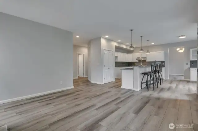 Spacious family room open to island kitchen