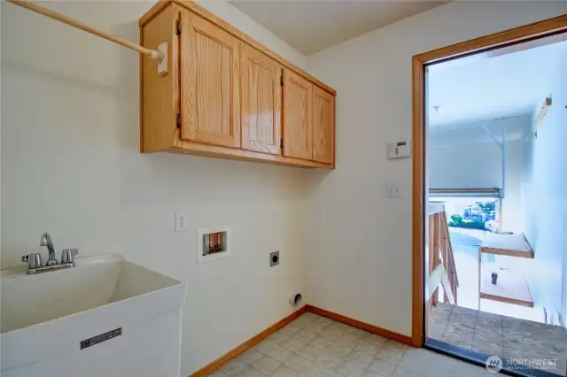 Indoor laundry room off of garage