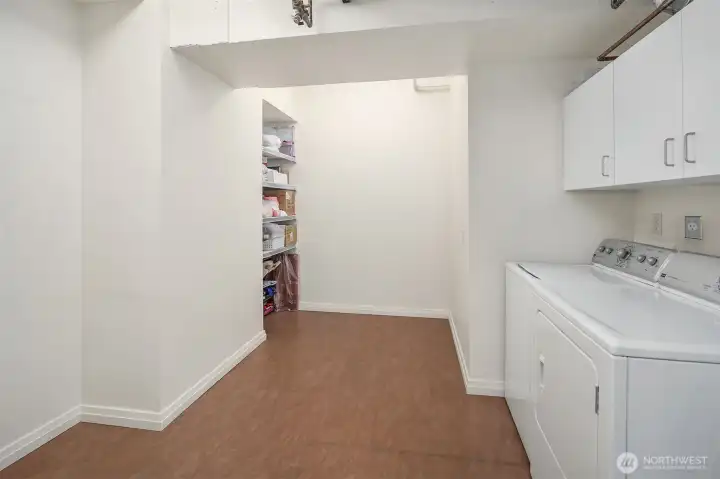 Large utility room has been converted in other units to an office.