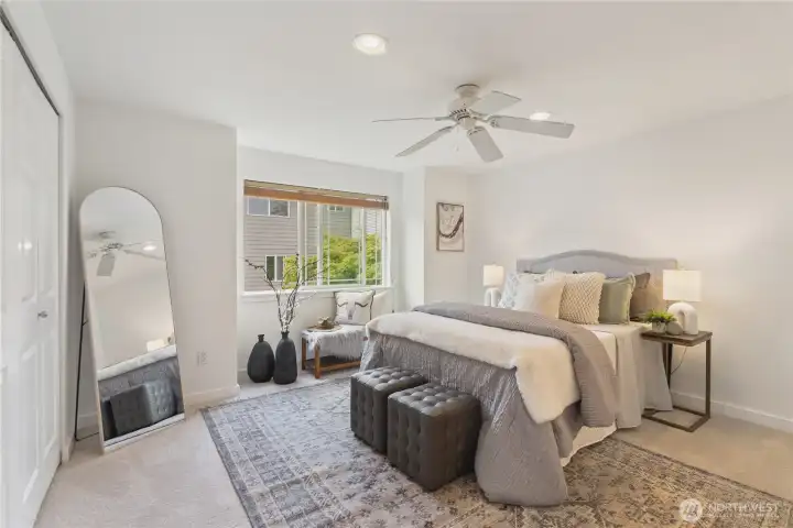 Huge primary suite large enough for king size bed. Features wlak-in closet, additional closet, bay window, en suite