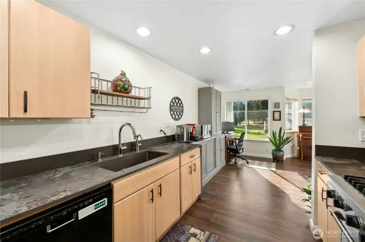 Kitchen with golf course view in background.
