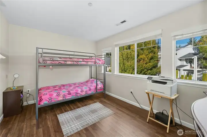 Bedroom #1 with large walk-in-closet on the left.