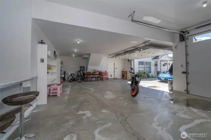 Large garage and storage in garage plus room off of garage