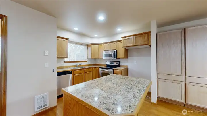 Dining area with pantry for storage.