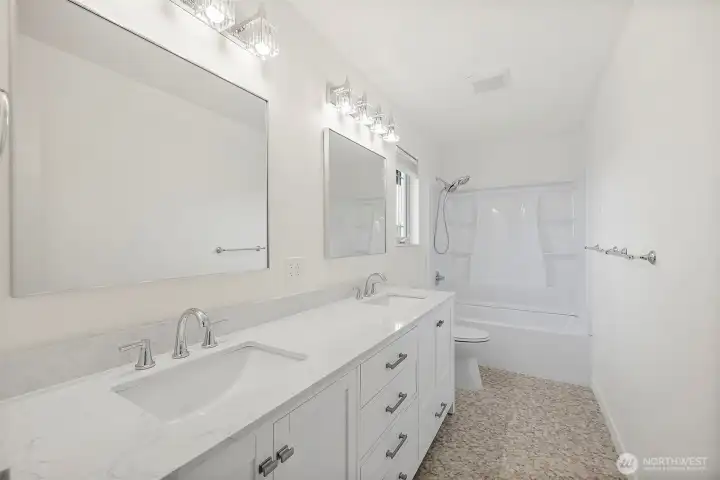 "The En Suite Boasts new everything, delta faucets, high end light fixtures   with plenty of countertop and cabinet storage"