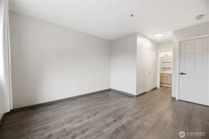 Another view of the primary bedroom.