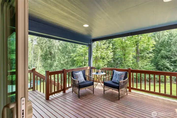 Covered deck to enjoy the outdoors year round!