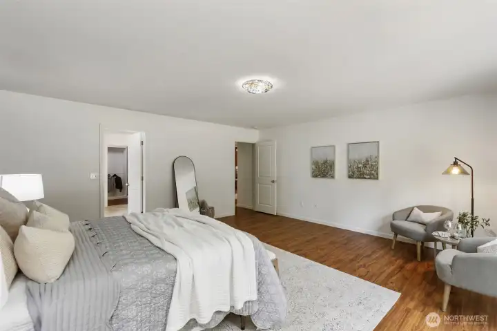 Another view of the primary suite...ensuite is off to the left and includes a generous closet with built-ins.