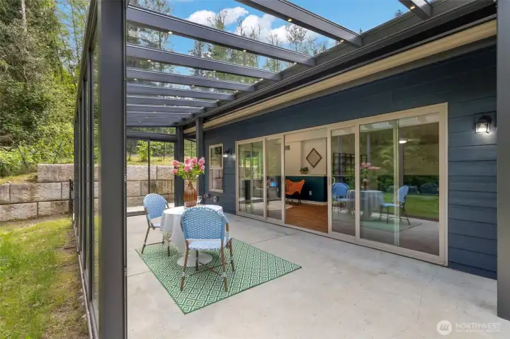 Gorgeous glass room with light built into the ceiling and doors that all slide open. The BEST indoor/outdoor setup! Over 300 sq ft (not included in total square footage).