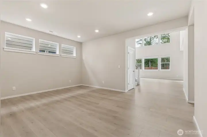 Huge dining room could accommodate a table seating as many as ten to twelve. Three large windows allowing a ton of light in this area. Photos are representative only and may display different color package and/or upgrades.